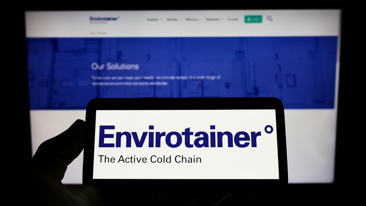 Stuttgart, Germany - 06-11-2022: Person holding cellphone with logo of Swedish logistics company Envirotainer AB on screen in front of business webpage. Focus on phone display. Image Credit: Adobe Stock Images/Timon